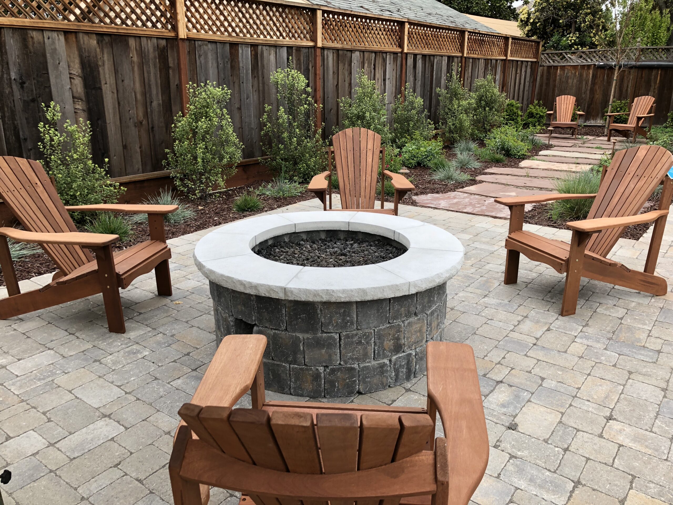 Stone deck with firepit built by Jack Cannon Lynstar Enterprises in Silicon Valley